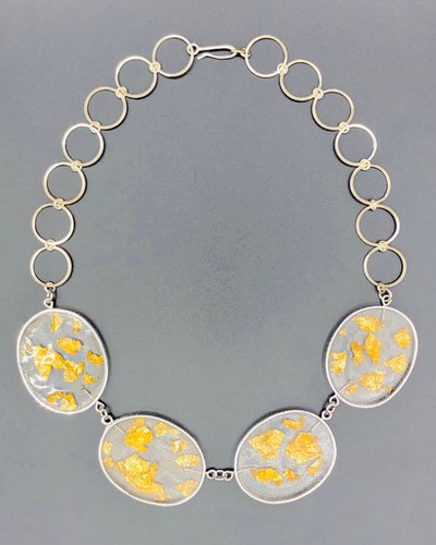 silver and resin necklace with 22 kt goldleaf
